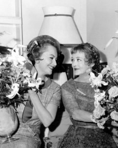 Olivia De Havilland Bette Davis with the floral gifts they exchanged on the first day of shooting, September 17 1964